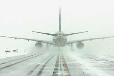 Plane landing in snow